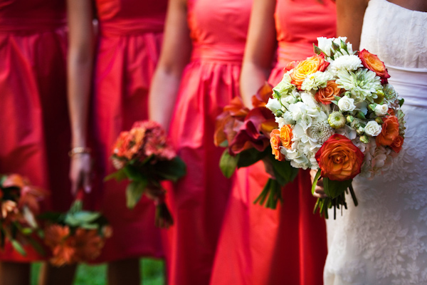 bride's white, coral, orange, and green bouquet - photo by Washington DC based wedding photographers Holland Photo Arts